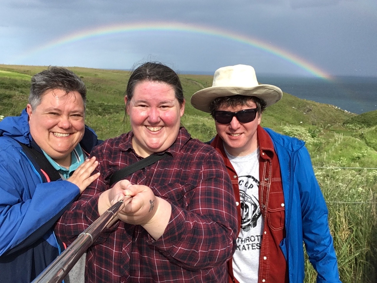 A selfie of the three donors in the countryside.