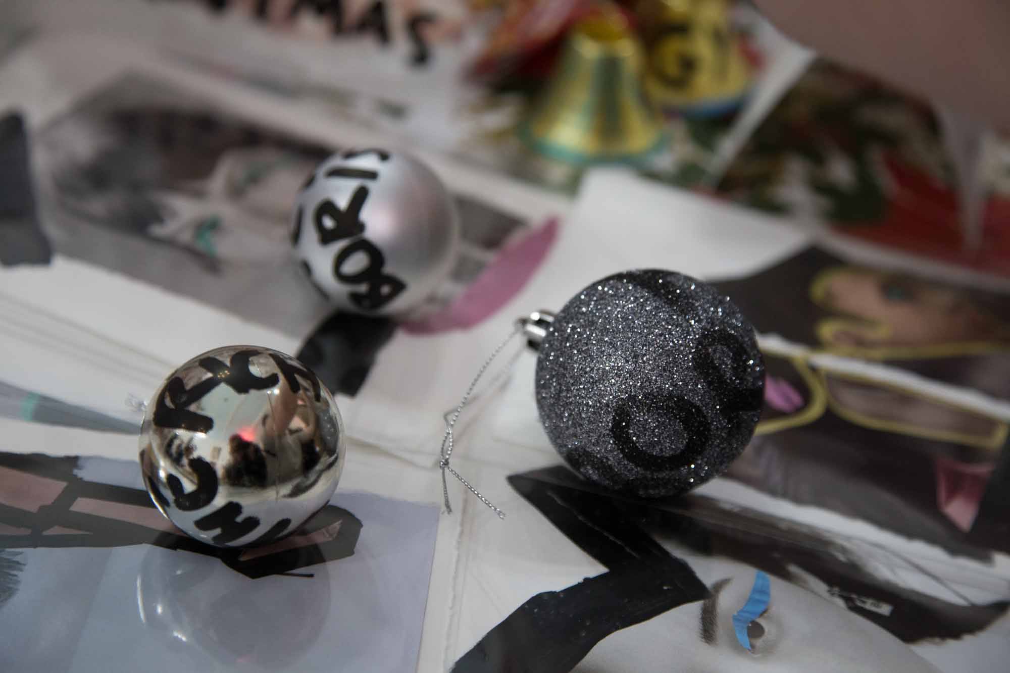 Close up for baubles featuring anti-Tory and anti-austerity slogans.