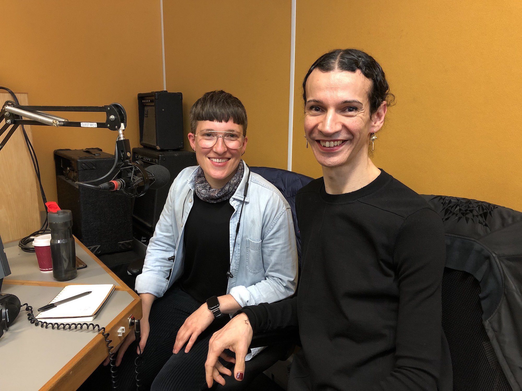 Nando Messias and Hester Chillingworthsit side by side in a radio recording studio