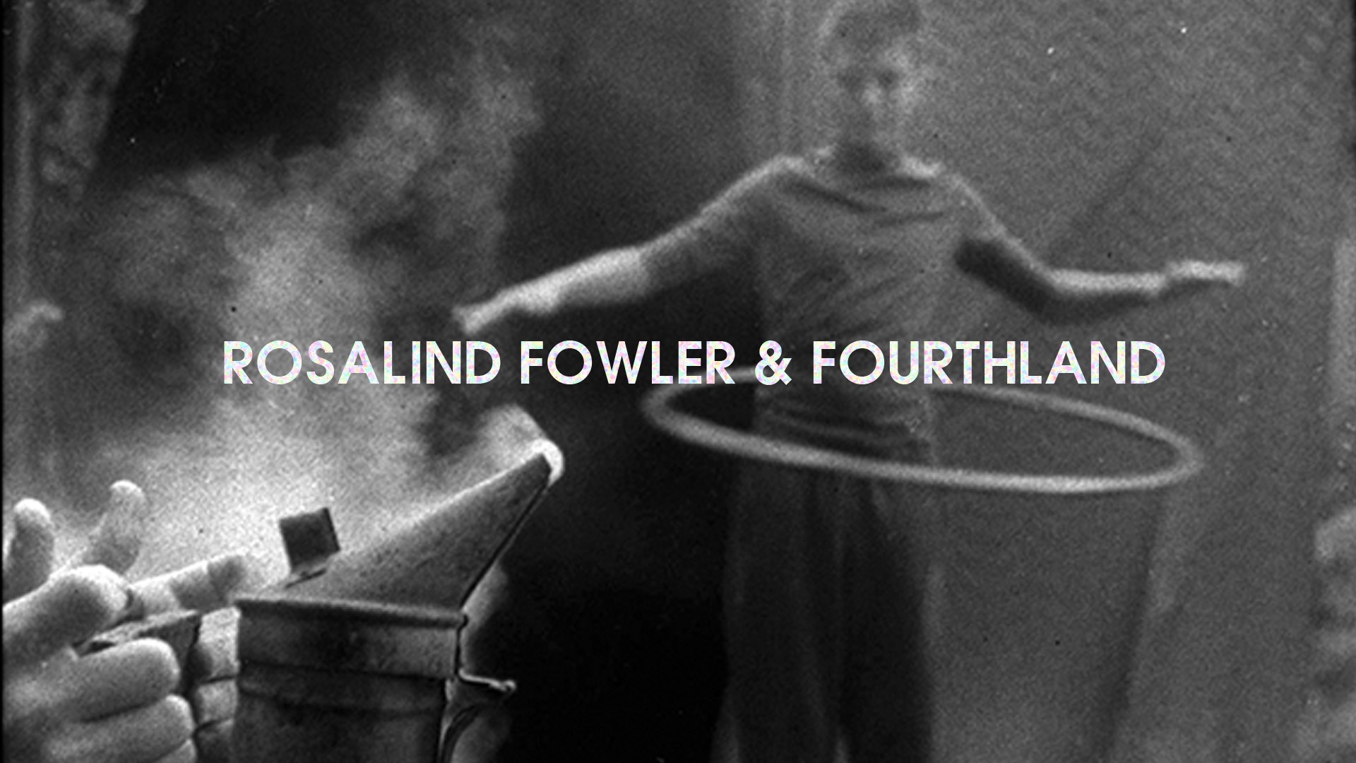 hands hold a burner whilst person hula hoops in the background